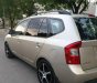 Kia Carens   2.0 2010 - Bán Kia Carens 2.0 năm 2010, màu vàng cát