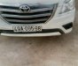 Toyota Innova E 2010 - Xe Toyota Innova E đăng ký lần đầu 2014, màu trắng còn mới, giá tốt 460 triệu