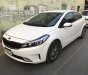 Kia Cerato 1.6MT 2016 - Bán Kia Cerato 1.6MT số sàn màu trắng sản xuất 2016 biển SG