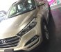 Hyundai Tucson 2018 - Bán ô tô Hyundai Tucson đời 2018, màu vàng, 838tr