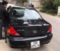 Kia Spectra 2003 - Cần bán lại xe Kia Spectra 2003, màu đen