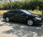 Toyota Camry 2.0E 2016 - Bán Toyota Camry 2.0E màu đen VIP số tự động, sản xuất cuối 2016, mẫu mới đi 19000km