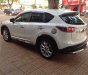 Mazda CX 5 2014 - Cần bán lại xe Mazda CX 5 2014, màu trắng còn mới, 740tr