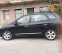 Kia Carens   2009 - Bán Kia Carens đời 2009, màu đen như mới, giá tốt