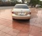 Toyota Vios 1.5E MT 2010 - Cần bán Toyota Vios E sản xuất năm 2010, màu vàng cát, giá chỉ 285 triệu