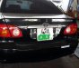 Toyota Corolla altis 2003 - Cần bán lại xe Toyota Corolla altis 2003, màu đen xe gia đình, giá chỉ 250 triệu