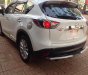 Mazda CX 5 2014 - Cần bán lại xe Mazda CX 5 2014, màu trắng còn mới, 740tr