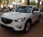 Mazda CX 5 2014 - Cần bán lại xe Mazda CX 5 2014, màu trắng còn mới, 740tr