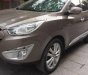 Hyundai Tucson  2.0AT 4WD 2011 - Bán Hyundai Tucson 2.0AT 4WD sản xuất năm 2011 còn mới