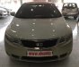 Kia Forte 1.6MT 2011 - Bán Kia Forte 1.6MT 2011, màu kem