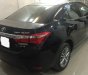 Toyota Corolla altis 1.8G 2015 - Bán ô tô Toyota Corolla altis 1.8G đời 2015, màu đen, 675tr