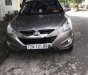 Hyundai Tucson 2.0 AT 4WD 2012 - Bán xe Hyundai Tucson 2.0 AT 4WD đời 2012, màu xám, xe nhập