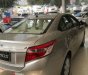 Toyota Vios 1.5E 2018 - Bán ô tô Toyota Vios 1.5E đời 2018, màu vàng cát