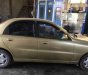 Daewoo Lanos SX 2002 - Bán Daewoo Lanos SX năm 2002, màu vàng cát