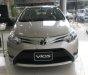 Toyota Vios 1.5E 2018 - Bán ô tô Toyota Vios 1.5E đời 2018, màu vàng cát