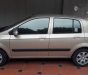 Hyundai Getz 2009 - Cần bán gấp Hyundai Getz đời 2009, màu ghi vàng  