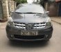 Nissan Grand livina 1.8 MT 2011 - Bán xe Nissan Grand Livina 1.8 MT sản xuất 2011, màu xám chính chủ, 350 triệu