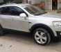 Chevrolet Captiva LT 2.4 MT 2013 - Bán Chevrolet Captiva LT 2.4 MT sản xuất 2013, màu bạc  