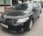 Toyota Corolla altis 1.8G MT 2010 - Bán ô tô Toyota Corolla altis 1.8G MT 2010, màu đen số sàn