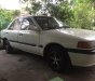 Mazda 323 1.6 MT 2001 - Cần bán gấp Mazda 323 1.6 MT năm 2001, màu trắng