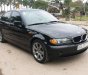 BMW 3 Series  318i  2002 - Bán xe BMW 3 Series 318i sản xuất 2002, màu đen  