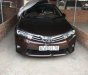 Toyota Corolla altis 1.8G MT 2014 - Bán ô tô Toyota Corolla Altis 1.8G MT năm 2014, màu nâu