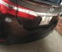 Toyota Corolla altis 1.8G MT 2014 - Bán ô tô Toyota Corolla Altis 1.8G MT năm 2014, màu nâu