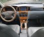 Toyota Corolla altis 1.3 MT 2003 - Bán Toyota Corolla Altis đời 2003, màu trắng xe gia đình, giá 238tr