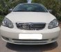 Toyota Corolla altis 1.3 MT 2003 - Bán Toyota Corolla Altis đời 2003, màu trắng xe gia đình, giá 238tr