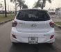 Hyundai Premio 2014 - Chính chủ bán Hyundai Grand i10 đời 2014, màu trắng, xe nhập