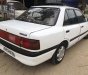 Mazda 323 1.6 MT 1995 - Bán Mazda 323 1.6 MT sản xuất 1995, màu trắng 