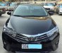 Toyota Corolla altis 2015 - Cần bán Toyota Corolla Altis sản xuất 2015, màu đen