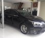 Toyota Corolla altis 1.8G AT 2017 - Bán xe Toyota Corolla Altis 1.8G AT sản xuất 2017, màu đen số tự động, 690 triệu