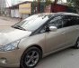 Mitsubishi Grandis 2009 - Bán Mitsubishi Grandis năm 2009, màu vàng cát