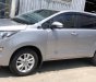 Toyota Innova E 2017 - Cần bán lại xe Toyota Innova E sản xuất năm 2017, màu bạc xe gia đình