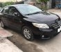 Toyota Corolla altis 1.8G MT 2009 - Bán Toyota Corolla altis 1.8G MT đời 2009, màu đen chính chủ giá cạnh tranh