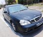 Daewoo Magnus 2.0 MT 2004 - Chính chủ bán Daewoo Magnus 2.0 MT 2004, màu đen