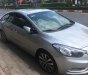 Kia K3 1.6AT 2013 - Cần bán lại xe Kia K3 1.6AT đời 2013, màu bạc