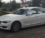 BMW 3 Series 320i 2014 - Cần bán gấp BMW 3 Series 320i đời 2014, màu trắng, nhập khẩu nguyên chiếc chính chủ, 950tr