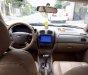 Ford Laser Ghia  2006 - Bán ô tô Ford Laser đời 2006, màu đen số tự động, 228tr