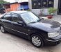 Ford Laser Ghia  2006 - Bán ô tô Ford Laser đời 2006, màu đen số tự động, 228tr