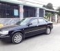 Ford Laser Ghia  2006 - Bán ô tô Ford Laser đời 2006, màu đen số tự động, 228tr