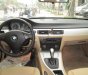 BMW 3 Series 320i 2009 - Chính chủ bán BMW 3 Series 320i đời 2009, màu trắng, xe nhập