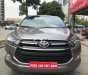 Toyota Innova 2.0E 2016 - Cần bán gấp Toyota Innova 2.0E năm 2016, màu nâu, 699 triệu