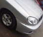 Daewoo Lanos SX 2005 - Cần bán Daewoo Lanos SX năm sản xuất 2005, màu bạc xe gia đình