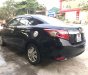 Toyota Vios 1.5E 2014 - Cần bán gấp Toyota Vios 1.5E năm sản xuất 2014, màu đen chính chủ