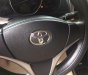 Toyota Vios 1.5E 2014 - Cần bán gấp Toyota Vios 1.5E năm sản xuất 2014, màu đen chính chủ