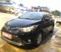 Toyota Vios 1.5E 2014 - Cần bán gấp Toyota Vios 1.5E năm sản xuất 2014, màu đen chính chủ