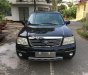 Ford Escape 2.3 AT 2004 - Cần bán gấp Ford Escape 2.3 AT năm sản xuất 2004, màu đen 