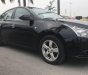 Chevrolet Cruze LT 2010 - Bán Chevrolet Cruze LT năm 2010, màu đen chính chủ, giá tốt